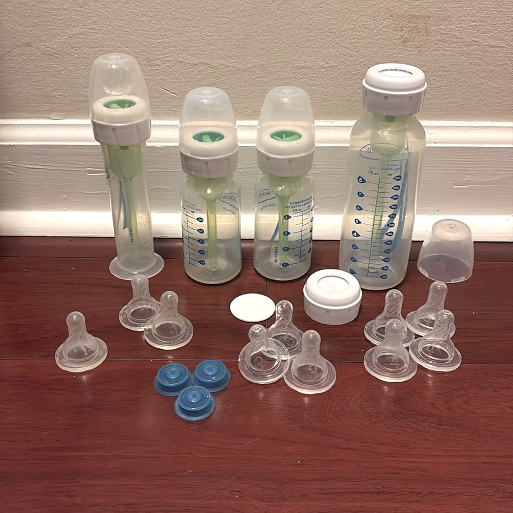 Dr. Brown's bottles with nipple and blue special needs valves